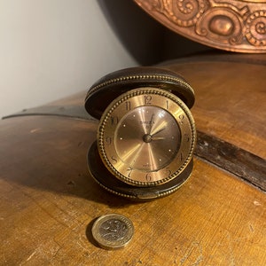 Swiza 8-Day Brass brown Leather Round Travel Clock, Wind Up Swiss made