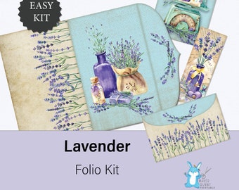 May include: Lavender folio kit with a blue and white background. The kit includes a variety of printable elements, including a lavender-themed envelope, a tag, and a decorative element. The kit is perfect for scrapbooking, card making, and other paper crafts.