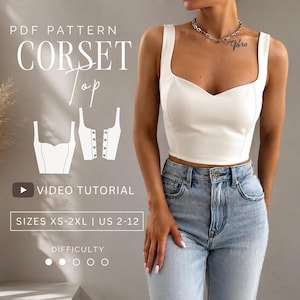 May include: A white corset top with wide straps and a sweetheart neckline, paired with light blue jeans. The image includes text: PDF PATTERN CORSET TOP, VIDEO TUTORIAL, SIZES XS-2XL | US 2-12, and a difficulty rating of one out of five circles.