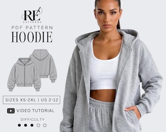 May include: A light gray zip-up hoodie with a hood, long sleeves, and front pockets. The image includes text: RE PATTERNS PDF PATTERN HOODIE, SIZES XS-2XL | US 2-12, VIDEO TUTORIAL, and a difficulty rating of three out of five black dots.
