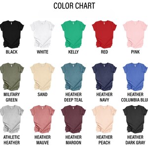 May include: A color chart displaying various t-shirt colors. The chart includes colors such as black, white, red, pink, military green, sand, and heather deep teal. Each color is labeled with its name.