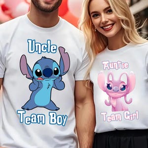 May include: Two white t-shirts with cartoon characters. The blue shirt says "Uncle Team Boy" and features Stitch. The pink shirt says "Auntie Team Girl" and features Angel.