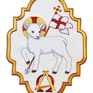May include: Embroidered patch featuring a white lamb with a halo, holding a staff with a flag. The lamb stands on a white background with a gold border and the Greek letters Alpha and Omega in red and gold.