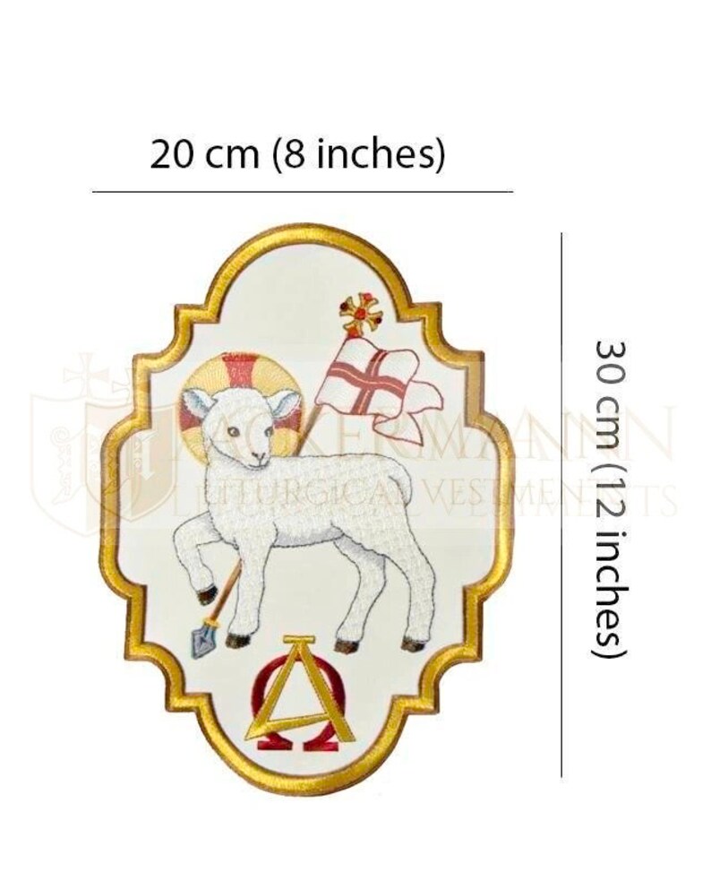 May include: White embroidered lamb with a golden halo, holding a staff with a red flag, and the Greek letters Alpha and Omega. The lamb is on a white background with a gold border. The image is 8 inches wide and 12 inches tall.