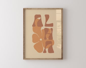 May include: A framed print with a retro-style graphic of the word "Aloha" in brown and orange, with a stylized flower design.