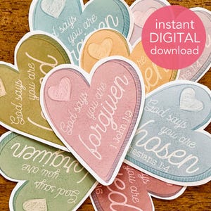 May include: A collection of heart-shaped stickers in various pastel colors, including pink, blue, and green. Each sticker features a heart design and inspirational text, such as "God says you are forgiven." A pink circle reads "instant DIGITAL download."