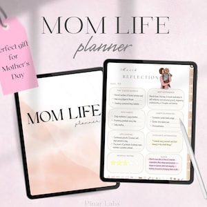 May include: A digital planner with a pink and white watercolor background. The planner is titled "Mom Life Planner" and features a section for March reflection with headings for top achievements, best experience, new habits, life lessons, favorite affirmation, monthly rating, and notes. The planner is displayed on a tablet with a white stylus.