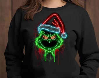 Descarga digital de personaje navideño con salpicaduras de neón / Cara divertida navideña SVG PNG / Diseño de camiseta con gorro de Papá Noel / Grinch PNG