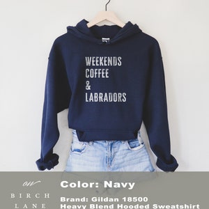 May include: Navy blue hooded sweatshirt with the text "Weekends Coffee & Labradors" printed in white. The sweatshirt is made by Gildan and is a heavy blend hooded sweatshirt.