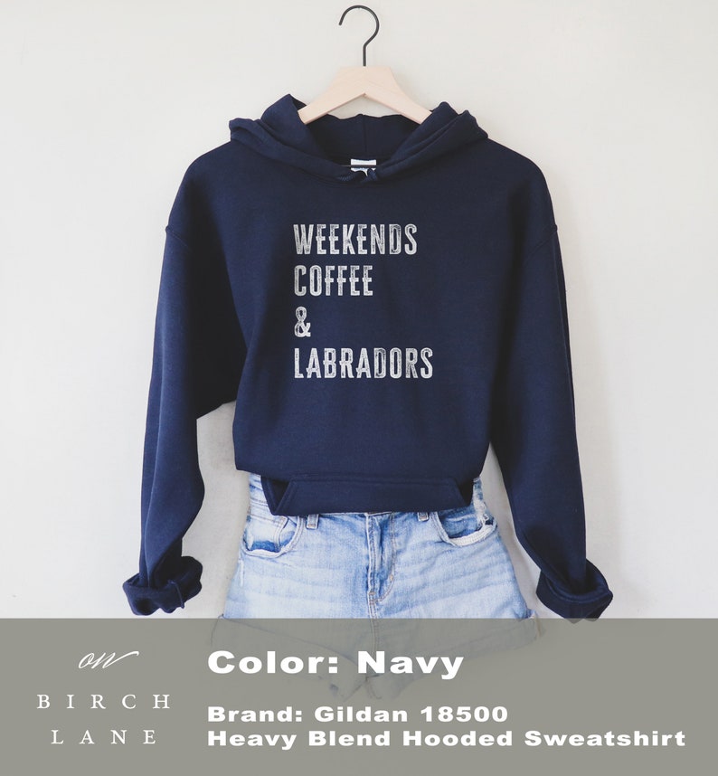 May include: Navy blue hooded sweatshirt with the text "Weekends Coffee & Labradors" printed in white. The sweatshirt is made by Gildan and is a heavy blend hooded sweatshirt.