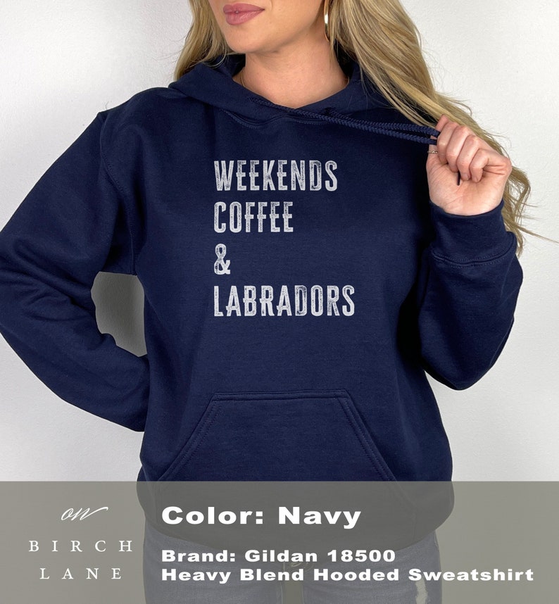 May include: Navy blue hooded sweatshirt with the text "Weekends Coffee & Labradors" printed in white on the front. The sweatshirt is a Gildan 18500 Heavy Blend Hooded Sweatshirt.