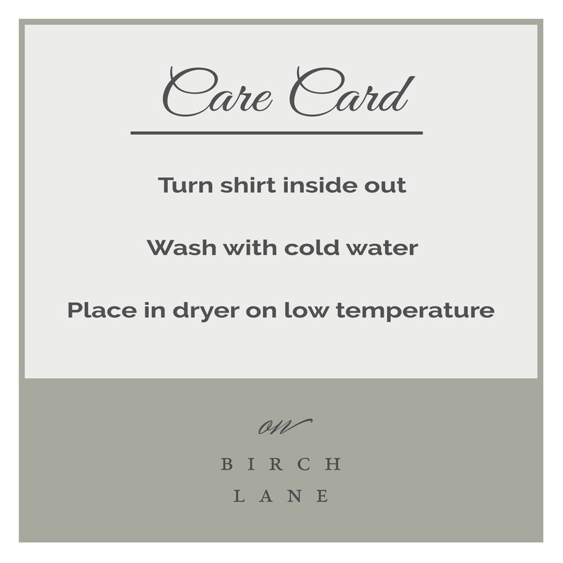 May include: Care card with instructions for washing and drying a shirt. The card says "Turn shirt inside out", "Wash with cold water", and "Place in dryer on low temperature". The card is from Birch Lane.