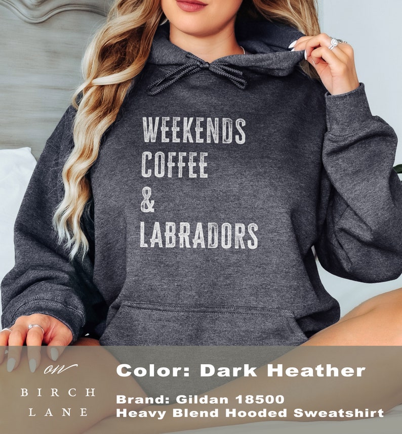 May include: Dark heather grey hooded sweatshirt with the text "Weekends Coffee & Labradors" printed in white.