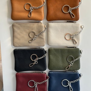 a bunch of purses that are sitting on a table