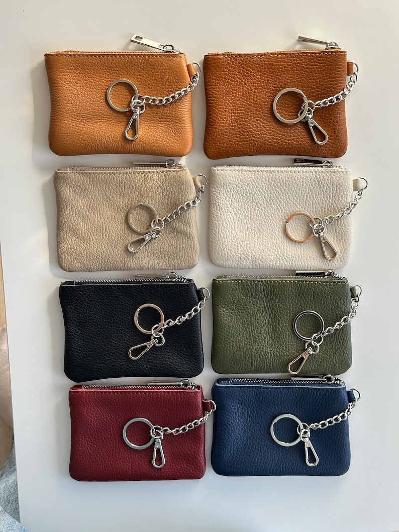 a bunch of purses that are sitting on a table