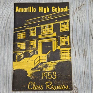 May include: A black and yellow booklet titled Amarillo High School 1953 Class Reunion. The cover features a graphic illustration of a school building with stairs, windows, and a central entrance, printed in yellow ink against a black background.