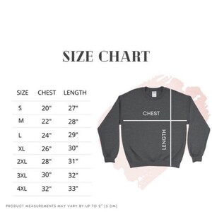 May include: A size chart for a dark gray sweatshirt, with chest and length measurements in inches. Sizes range from S to 4XL. The text "SIZE CHART" is at the top. Product measurements may vary by up to 2" (5 cm).