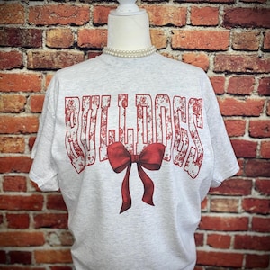 Bulldogs Shirt | Bulldogs Football Shirt | Football Mom Shirt | Coquette | Bulldogs Cheer | Bulldogs | Football Mama | Bulldogs Bow Shirt