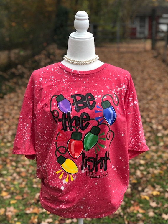 Be The Light Christmas Shirt | Bleached Christmas Shirt | Matthew 5:14 | Jesus Christmas Shirt | Christmas Lights Shirt | ChristianShirt