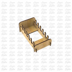 May include: A wooden laser-cut file holder with a rectangular base and multiple vertical slots. The holder is made of light brown wood and features a decorative design. The text "Laser Cut File" is visible on the right side of the image.