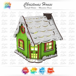 May include: A green Christmas house tealight holder with a snowy roof and red trim. The miniature house has windows and a chimney. The text "Christmas House" and "Tealight Holder - Miniature House" are visible.