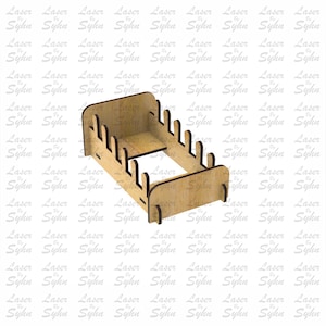 May include: A laser-cut wooden organizer with a rectangular base and multiple vertical slots. The design includes the text "Laser Cut File" and the name "Laser Syhn". The organizer is likely for storing small items.