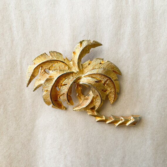 Costume jewelry palm best sale beach