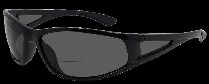 May include: Black wraparound sunglasses with a sporty design. The sunglasses have a dark gray lens and a black frame.