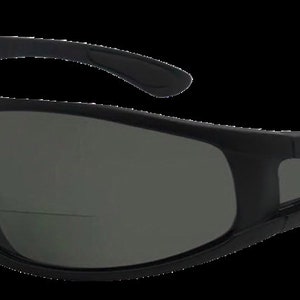May include: Black wraparound sunglasses with a dark gray lens.