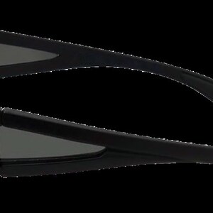 May include: Black wraparound sunglasses with a dark gray lens.