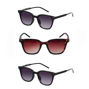 May include: Three pairs of sunglasses are displayed. Two pairs have black frames with dark gradient lenses. The third pair has a tortoiseshell frame with brown gradient lenses. All have a square shape and small silver accents.