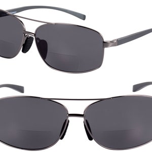 May include: A pair of black aviator sunglasses with a metal frame and gray lenses. The sunglasses have a clip-on feature for reading glasses.