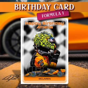 May include: A Formula 1 birthday card featuring a driver wearing a yellow and black patterned helmet and orange racing suit. The text reads Happy Birthday Amelia and McLaren. A race car is shown at the bottom against a checkered flag background.