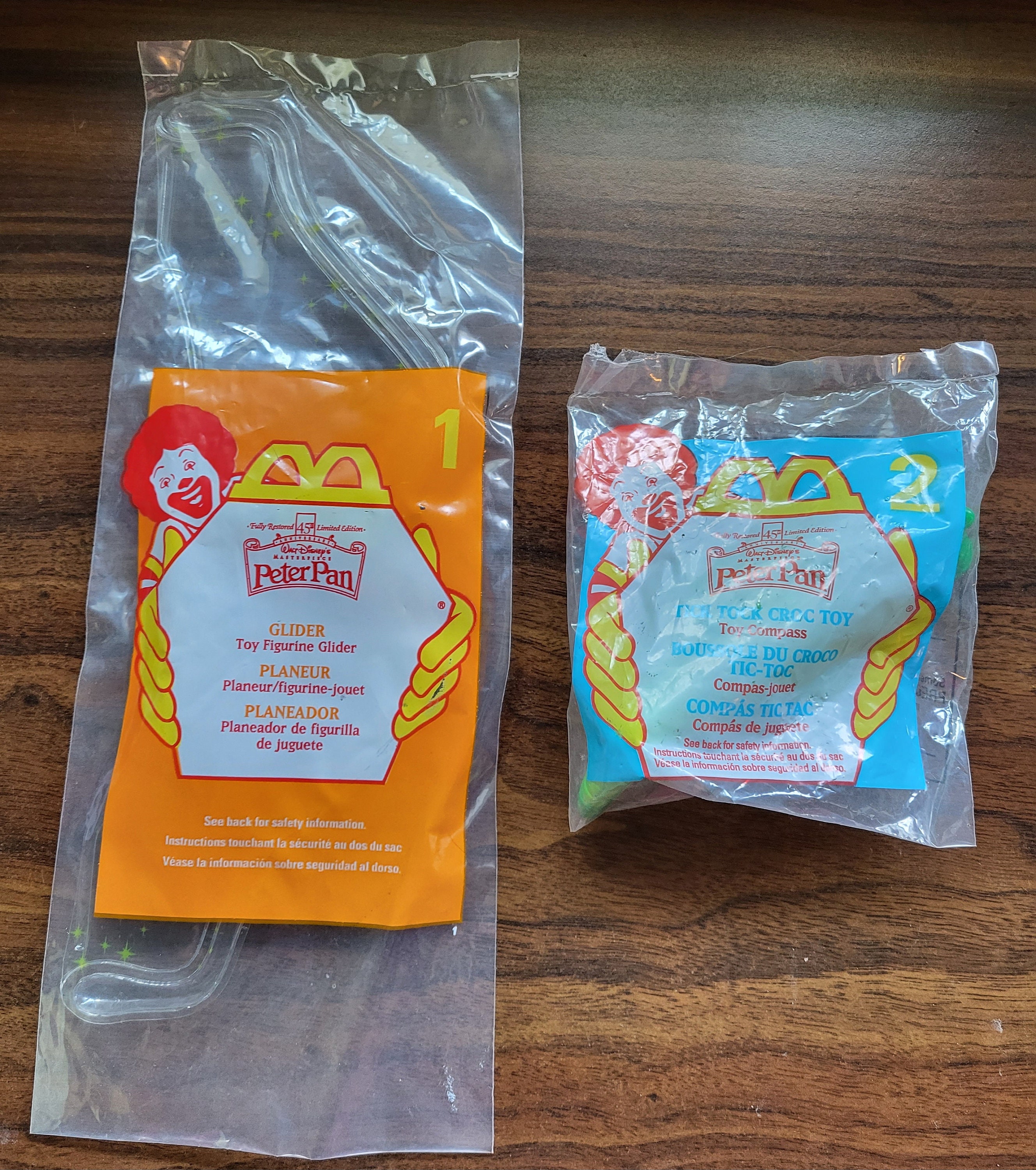 Here is Mcdonalds Peter Pan Glider and Tick Tock Croc Collectables 1