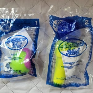 Lot of 2 McDonald&#39;s Happy Meal Toys-American Idol-#1 Disco Dave and #2 Judgmental Mic- All are in the original unopened packages.