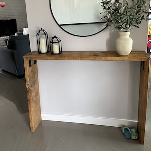 Long table 2024 behind couch called