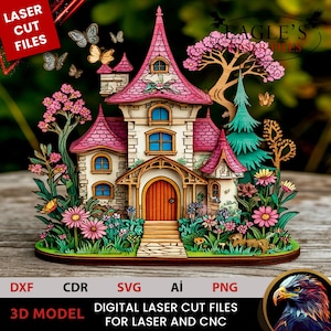 Op de afbeelding: Een lasergesneden 3D-model van een grillig feeënhuis met roze dakpannen, een oranje deur en kleurrijke bloemen. Het model bevat de tekst "LASER CUT FILES" en "DIGITAL LASER CUT FILES FOR LASER AND CNC".