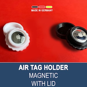 Könnte beinhalten: Ein weißer und schwarzer AirTag-Halter mit Deckel. Der Halter ist magnetisch und hat ein kreisförmiges Design mit einem erhöhten Rand. Der Deckel ist ebenfalls kreisförmig und hat einen erhöhten Rand. Der Halter ist für einen Apple AirTag ausgelegt. Der Text "AIR TAG HOLDER MAGNETIC WITH LID" wird unter dem Bild angezeigt.