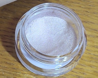 Sombras de ojos sueltas naturales en tonos blancos y naranjas