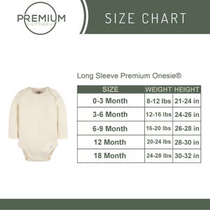 May include: Cream-colored long-sleeve baby onesie with a size chart. The chart lists sizes from 0-3 months to 18 months, with corresponding weight and height in pounds and inches. The brand logo is visible.