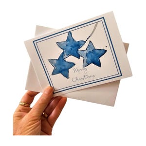 Star Bright blanco Merry Christmas-wenskaart met blauwe sterren, kerstkaart