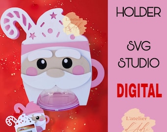 May include: A digital SVG file for a Santa Claus candy holder. The holder is shaped like a mug with a candy compartment. The design includes a candy cane, a star, and a Santa face.