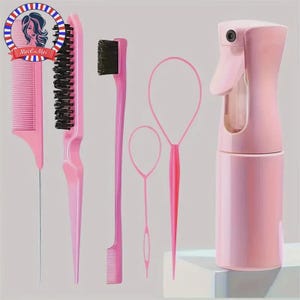 May include: A set of pink hair styling tools, including combs, brushes, and a spray bottle. The tools are arranged on a light background. The set includes a comb with a metal pick, a brush with black bristles, and a fine-tooth comb.