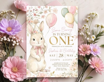 May include: A birthday invitation featuring a watercolor illustration of a bunny wearing a party hat and holding a pink balloon. The text reads "Some Bunny is Turning One" with event details, surrounded by floral accents.