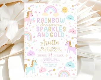 May include: A whimsical invitation with a rainbow, unicorn, and cloud theme. The text reads "Rainbow Unicorns Sparkles and Gold" with the name "Ariella" and details for a 3-year-old's birthday party. Pastel colors and stars decorate the invitation.