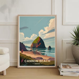 Könnte beinhalten: Gerahmter Kunstdruck mit einer stilisierten Illustration von Cannon Beach, Oregon. Das Kunstwerk zeigt eine große Felsformation an einem Sandstrand unter blauem Himmel mit flauschigen Wolken. Der Text "CANNON BEACH - OREGON" ist unten abgebildet.