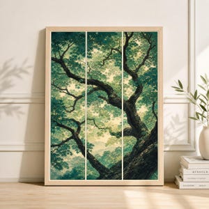 May include: A framed art print featuring a detailed illustration of a large tree with sprawling branches and lush green foliage. The artwork is divided into three vertical panels, creating a unique visual effect. The color palette includes shades of green, brown, and yellow.