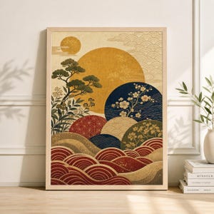 May include: Framed art print featuring a Japanese-inspired landscape. The artwork showcases a large yellow sun, stylized mountains, and a variety of floral and geometric patterns in shades of red, blue, and green. The print is in a light-colored wooden frame.