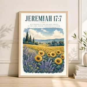 May include: Framed art print featuring a vibrant field of sunflowers and lavender under a blue sky. The artwork includes the text "JEREMIAH 17:7" and a related Bible verse. The print is in a light-colored wooden frame.