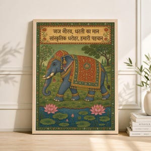 May include: An illustrated print of a blue elephant adorned with ornate red and gold ceremonial coverings. The elephant walks near a pond with pink lotus flowers. The artwork is framed and includes text in a foreign language at the top.